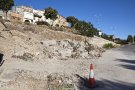 Ciutadilla reconstrueix per fi el mur que 'apuntala' el poble