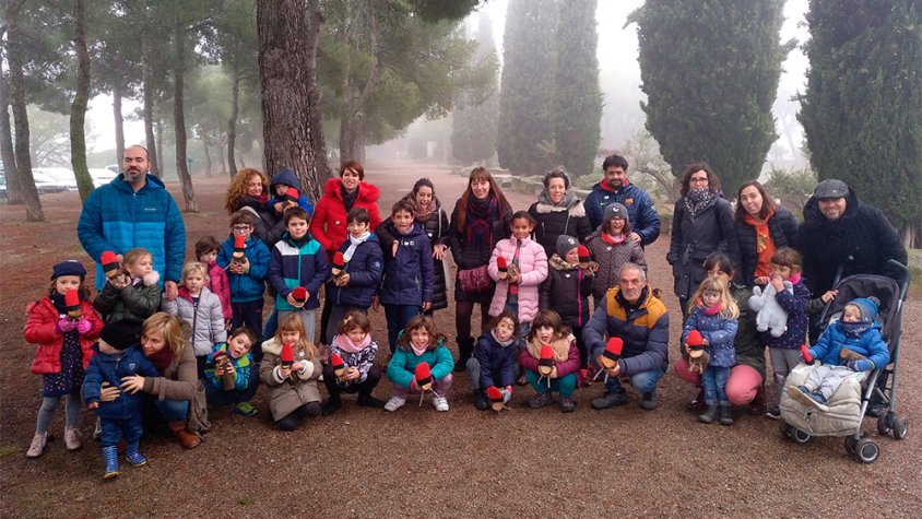 Foto de grup dels infants participants en l'activitat de recerca del Tió
