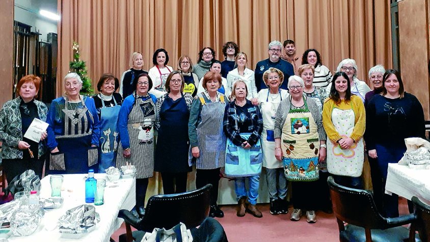 Foto de família del taller de Nadal a Taula