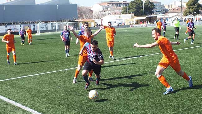 Un moment del partit