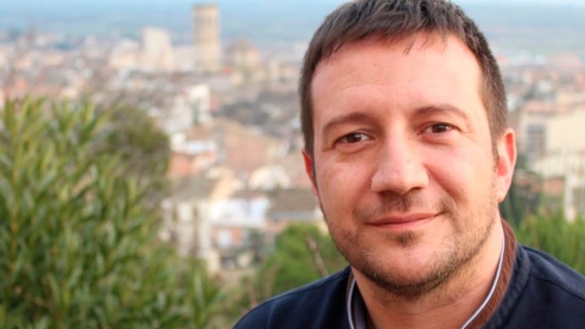 Òscar Amenós amb Tàrrega al fons