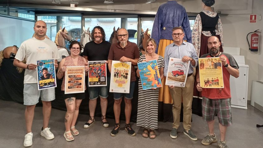 Presentació dels cartells de les diferents activitats i del cartell guanyador