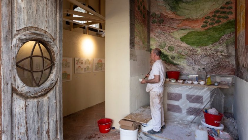 Josep Minguell pintant els frescos del tabernacle de Castelfiorentino